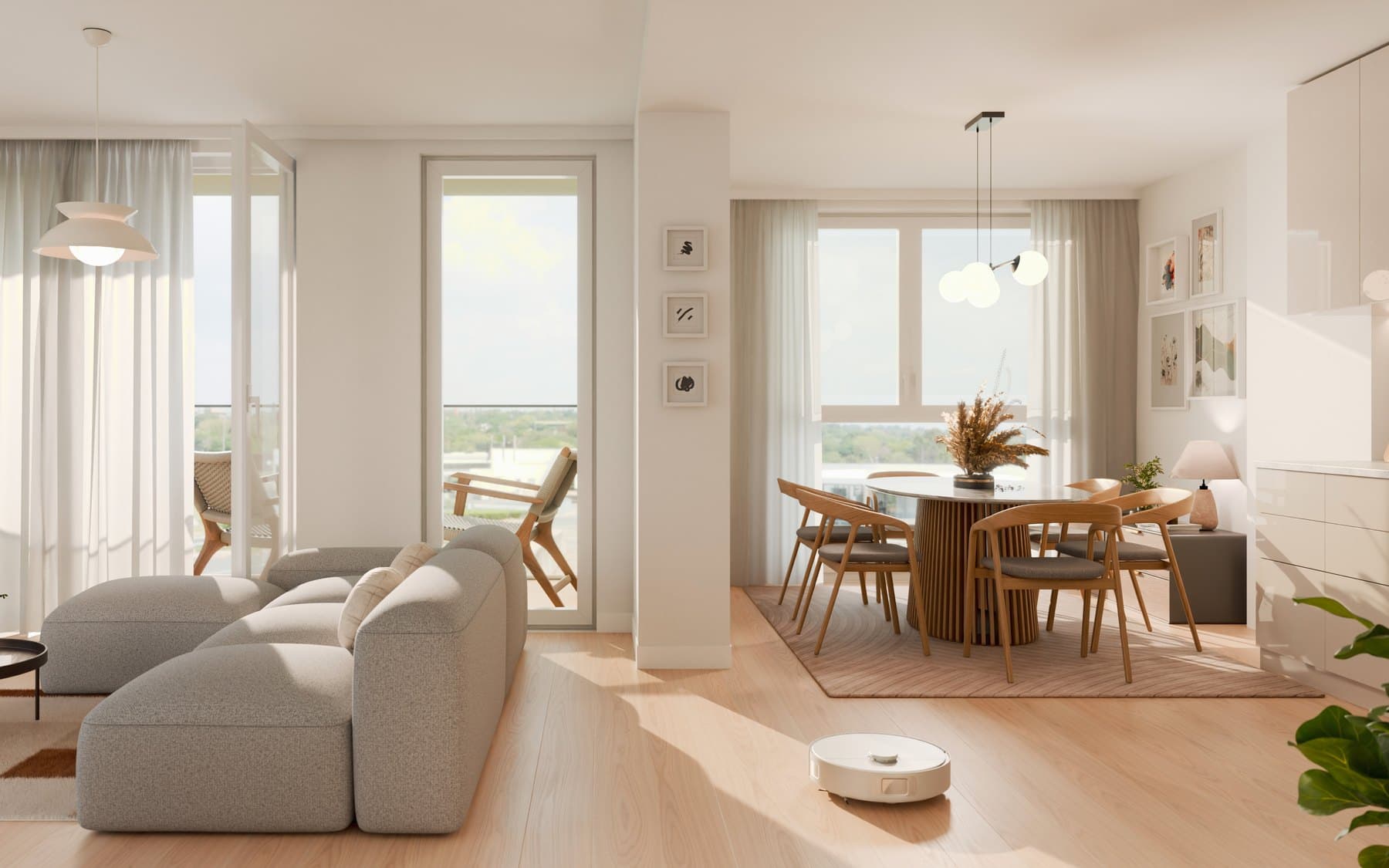 Interieurimpressie van type A: open woon- en eetkamer met veel daglicht en toegang tot het balkon