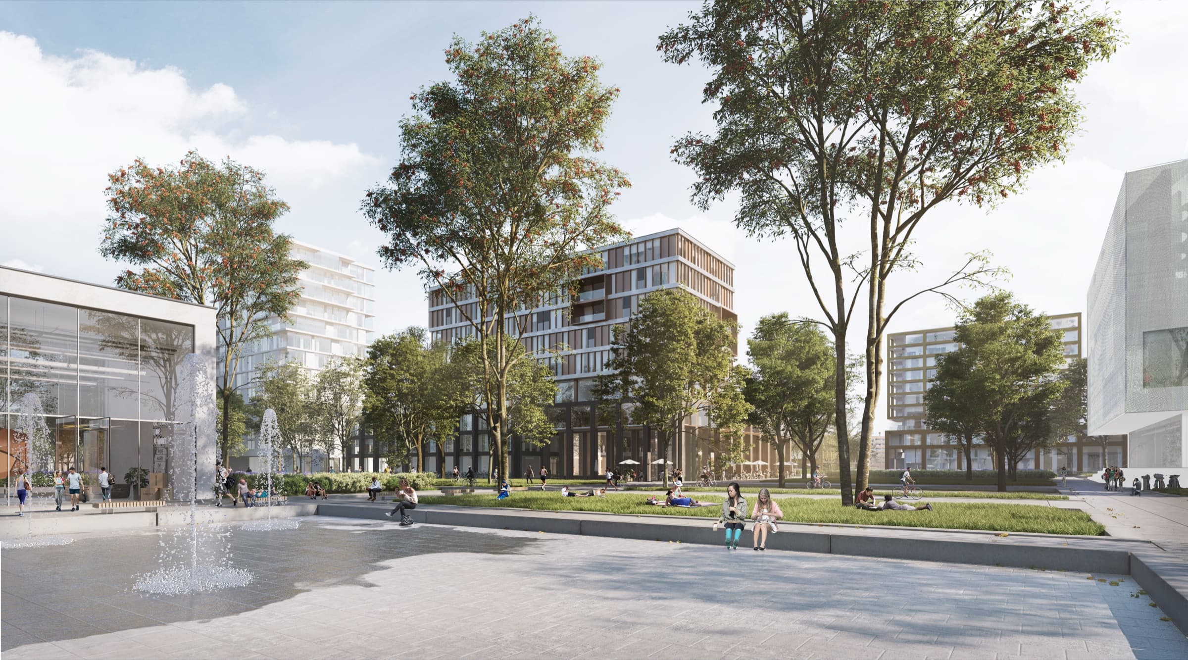 Impression of the Terrassenplein in Park MORE with fountains, trees and a sunny lawn