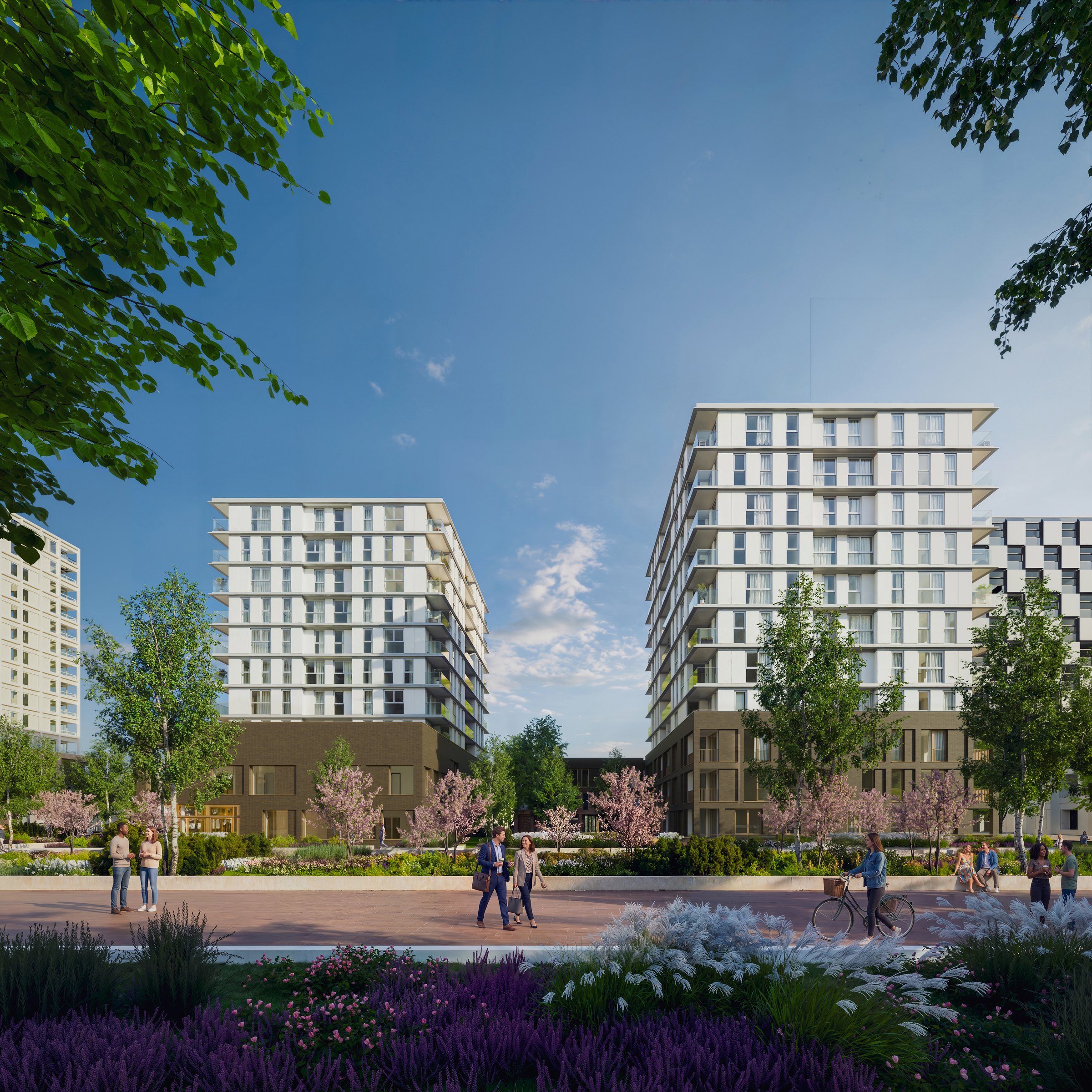 The two residential towers of MORE4 in spring, seen from the gardens